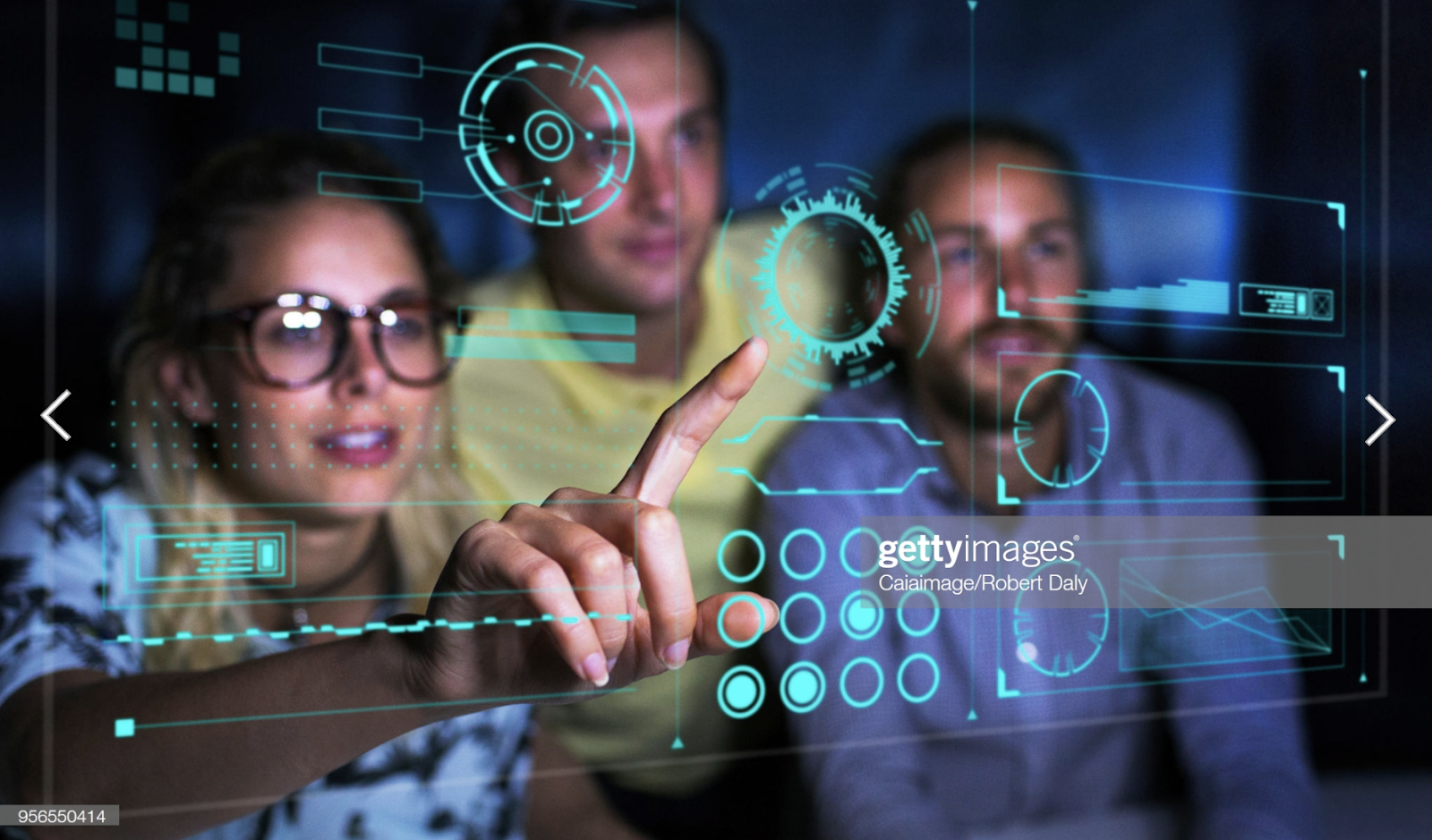 stock photo of people interacting with a digital screen
